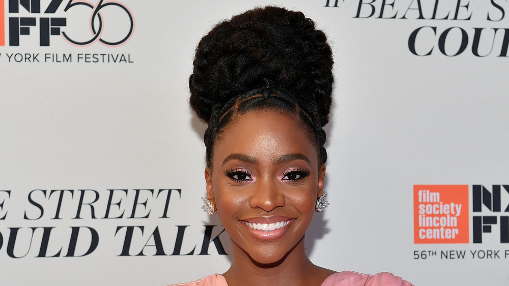 Teyonah Parris smiling