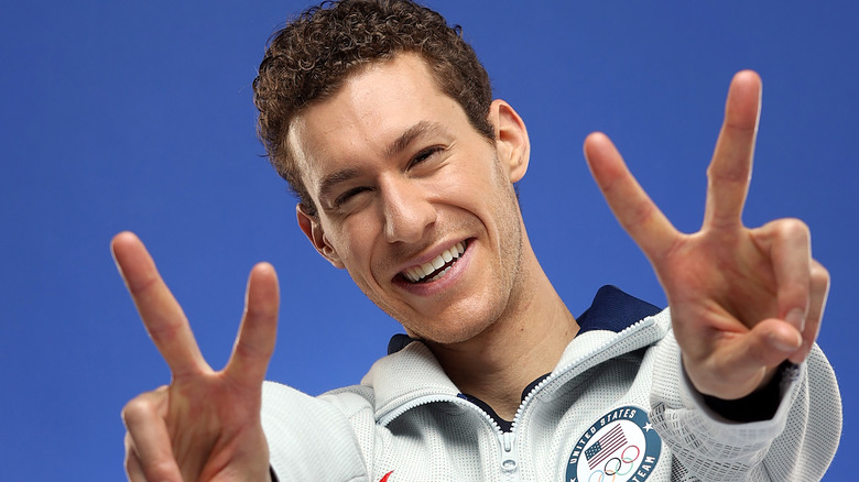 Jason Brown making peace hand signs