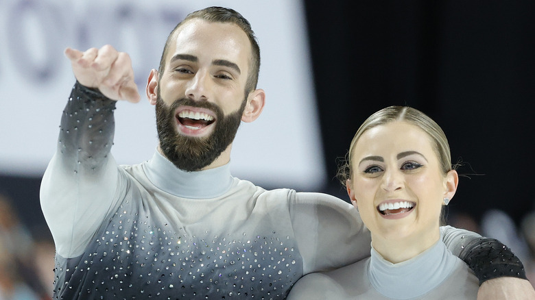 Timothy LeDuc, Ashley Cain-Gribble smiling on ice