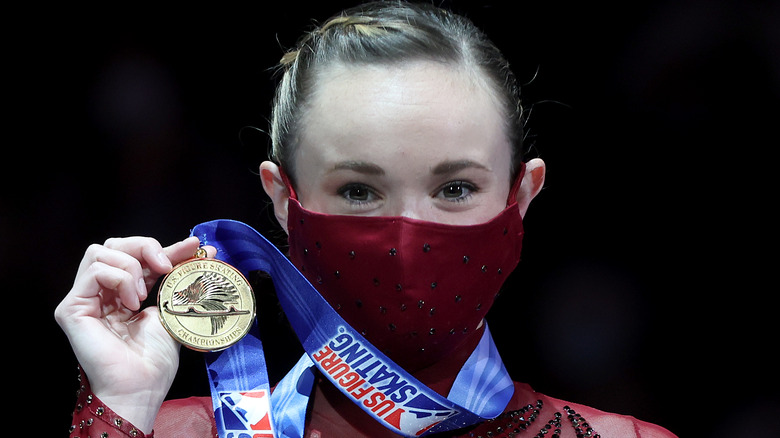 Mariah Bell holding gold medal