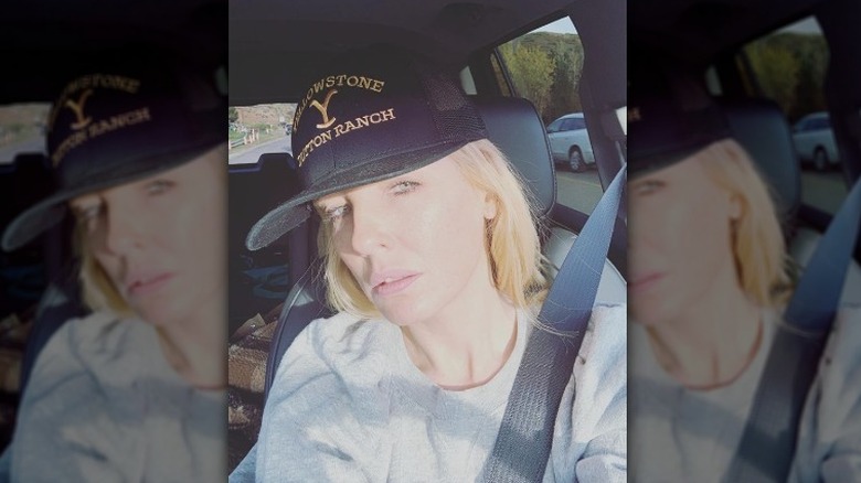 Kelly Reilly taking selfie in car