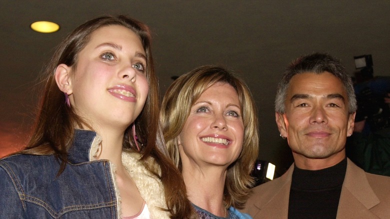 Olivia Newton-John and Patrick Kim McDermott with her daughter