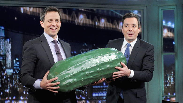 Seth Meyers and Jimmy Fallon with pickle