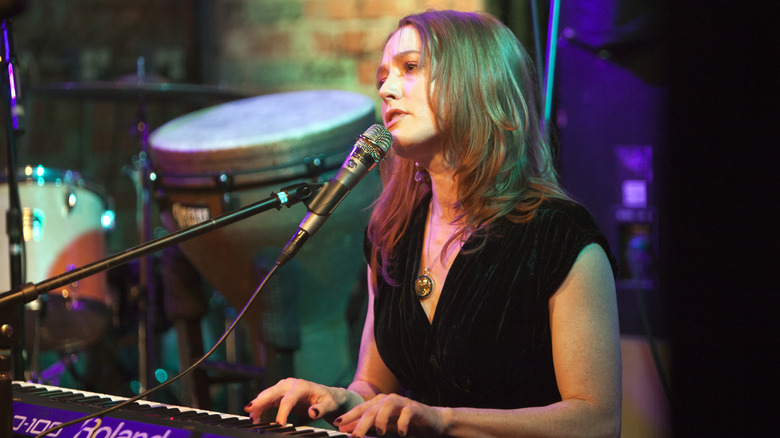 Alicia Witt performing on piano