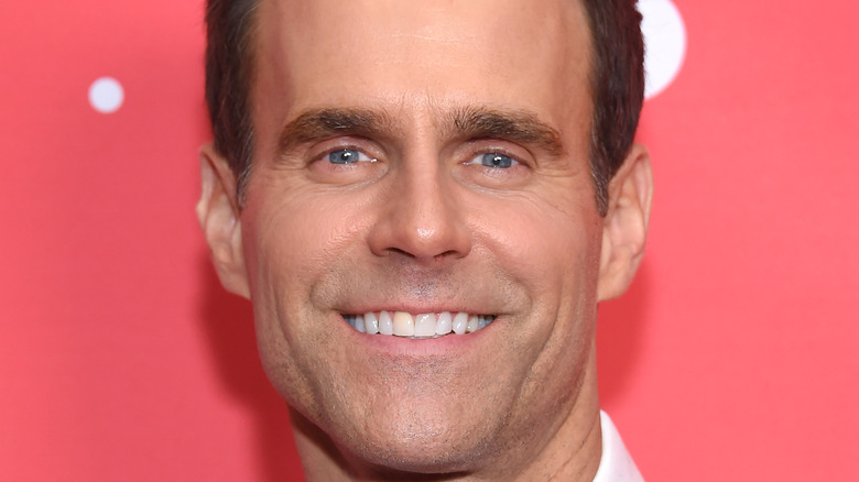 Cameron Mathison smiling at camera