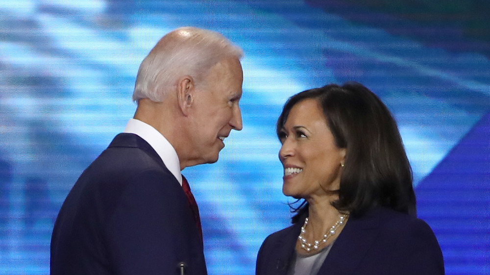 Joe Biden looking at Kamala Harris