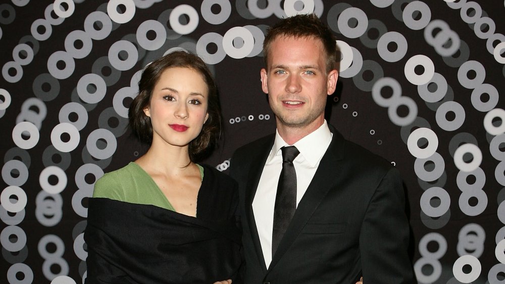 Troian Bellisario and Patrick J. Adams at a ceremony in 2011