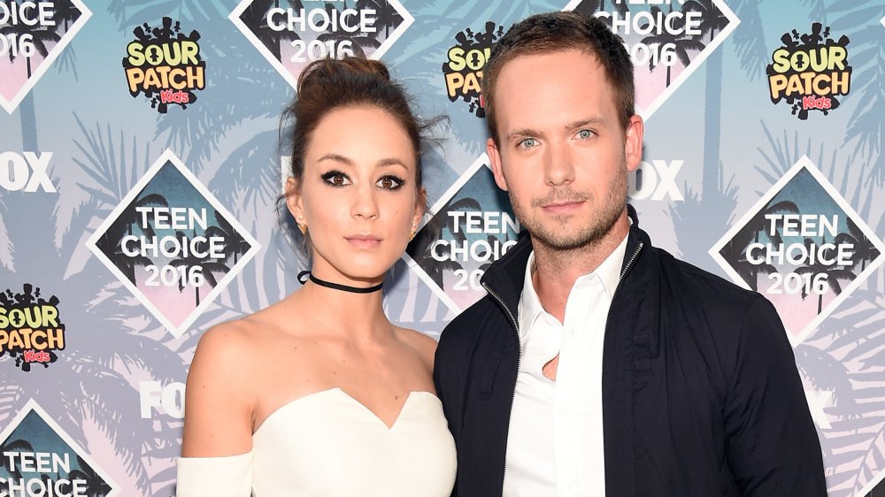 Troian Bellisario and Patrick J. Adams at an awards show in 2016