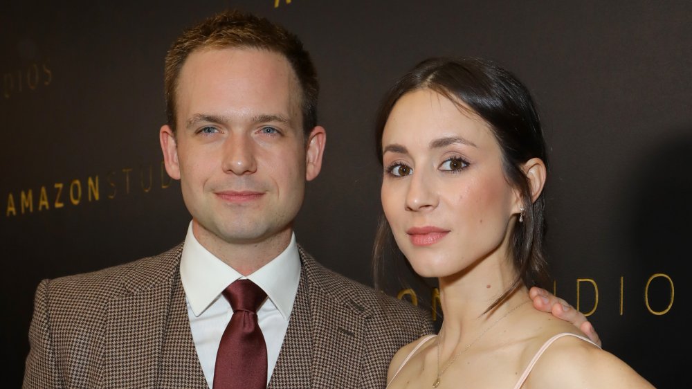 Troian Bellisario and Patrick J. Adams at a party in 2020