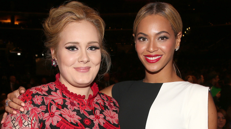 Adele and Beyoncé pose together at an event