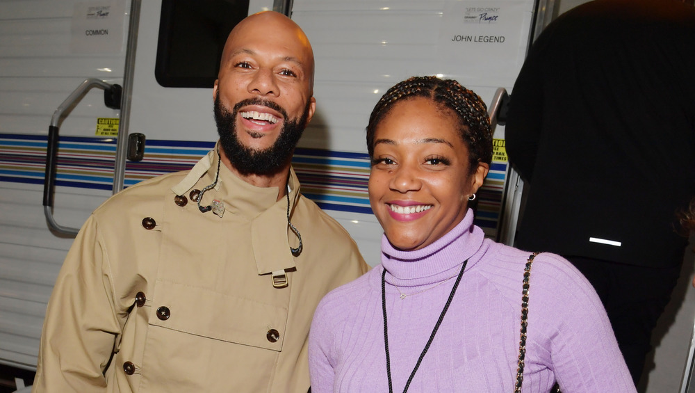 Common posing with Tiffany Haddish