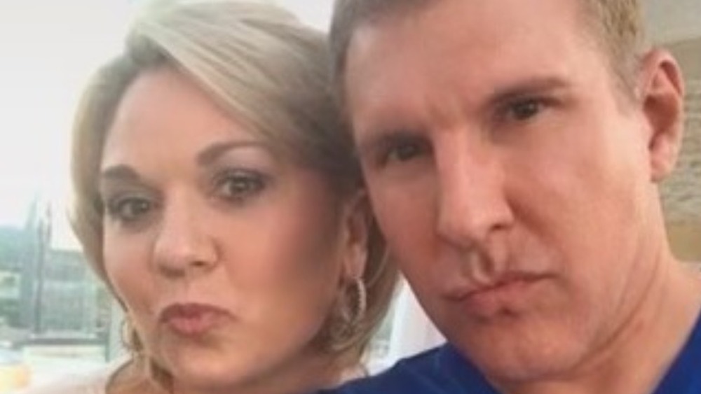 Todd and Julie Chrisley making duck faces