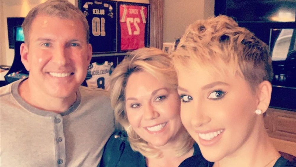 Todd, Julie, and Savannah Chrisley smiling