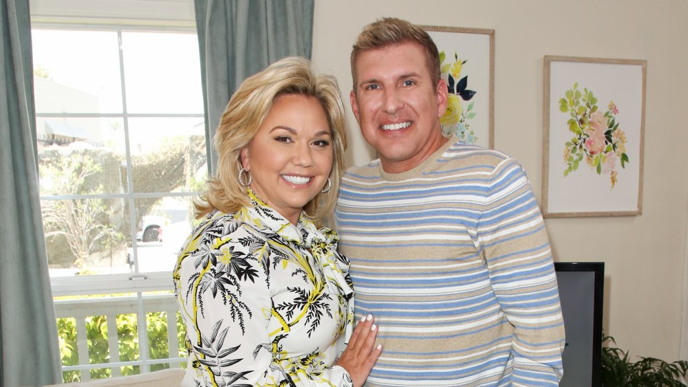 Julie Chrisley and Todd Chrisley in their living room