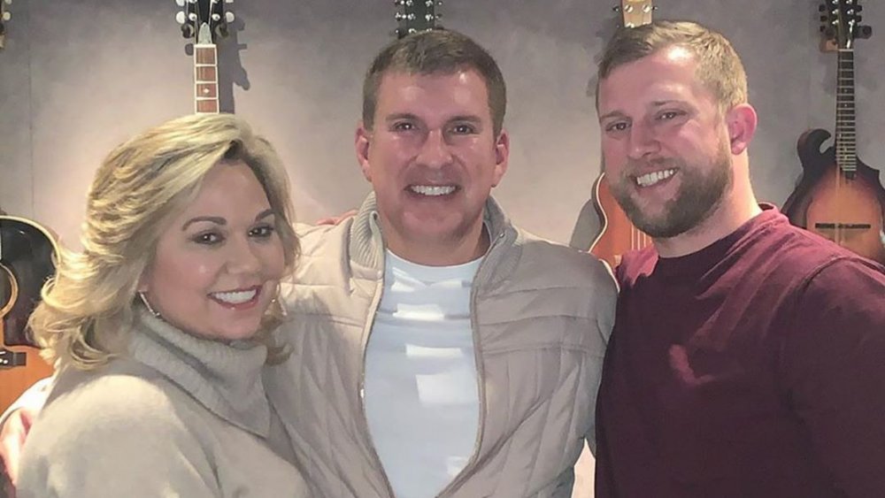 Kyle Chrisley with Todd and Julie Chrisley