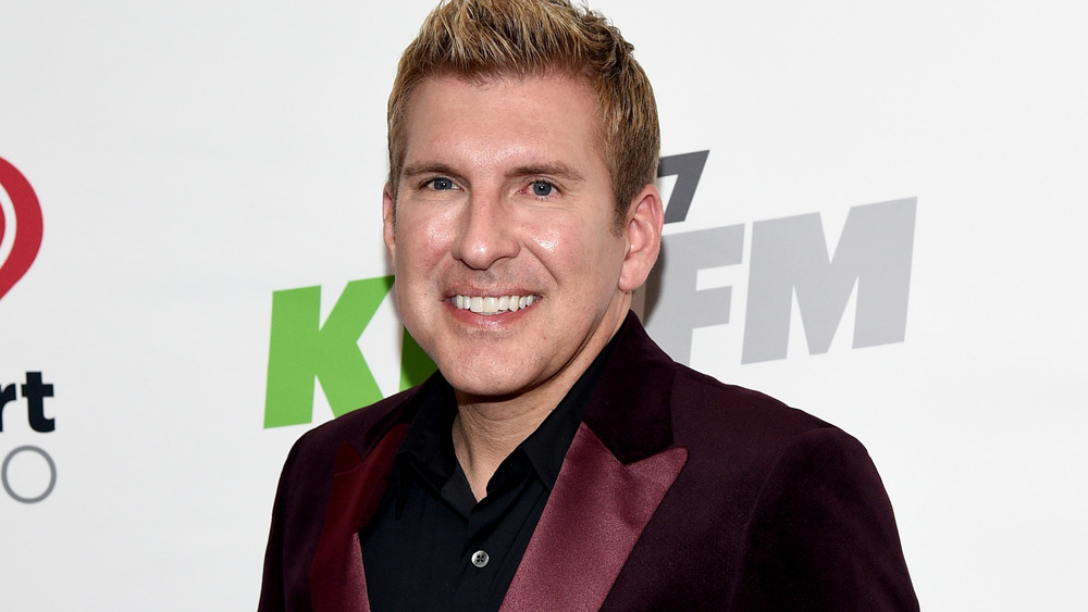 Todd Chrisley smiling at event