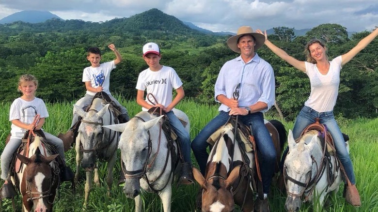 Tom Brady with his family on horses