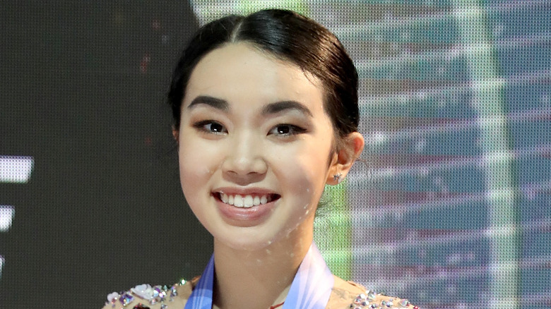 Karen Chen smiling wearing a medal