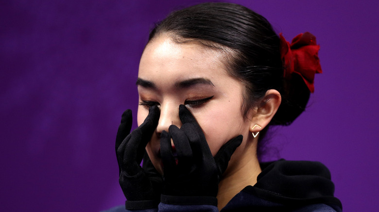 Karen Chen wiping her eyes