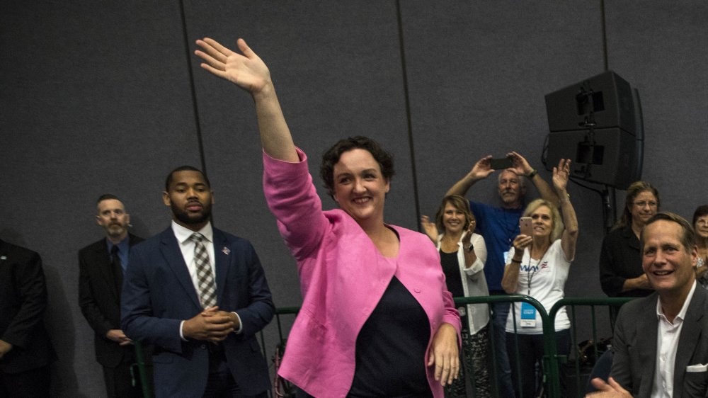 Katie Porter waving to supporters