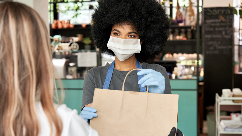 woman wearing face mask at work