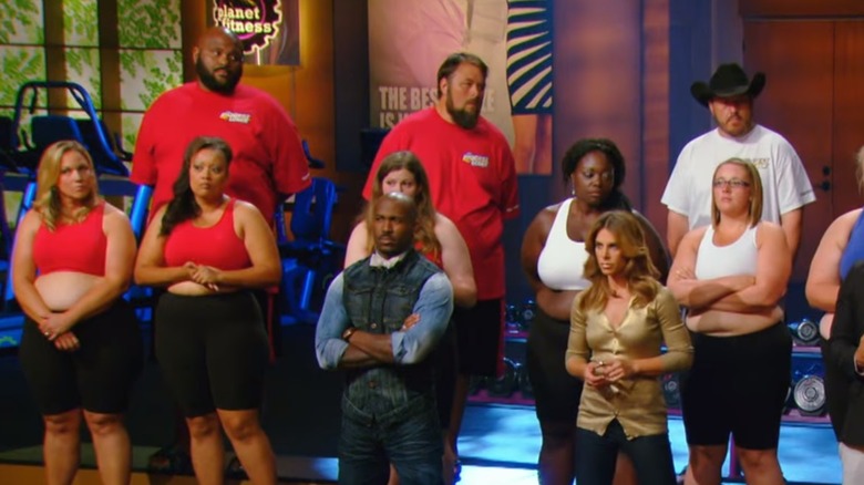 Contestants and trainers on The Biggest Loser in 2013