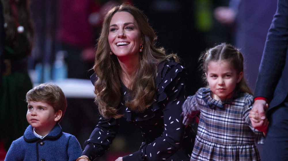 Kate Middleton with her children at an event