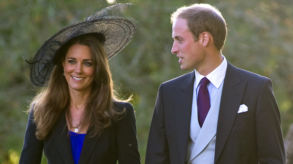 Kate Middleton and Prince William walking outside