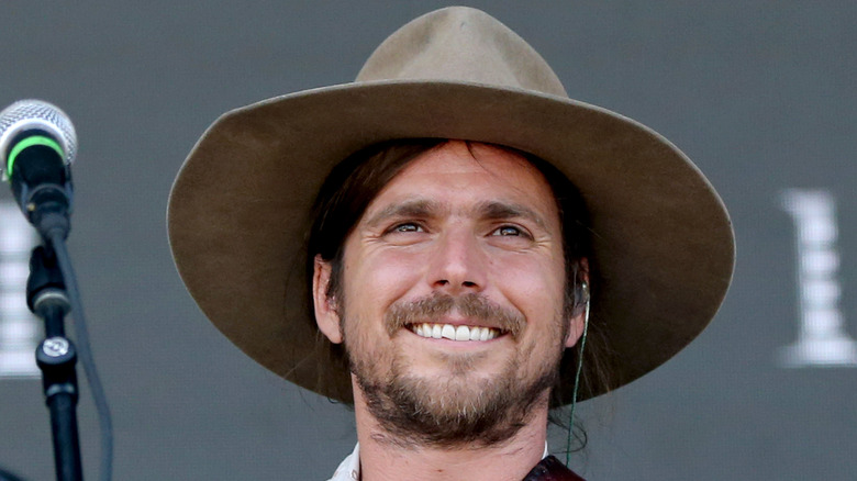 Lukas Nelson smiling onstage