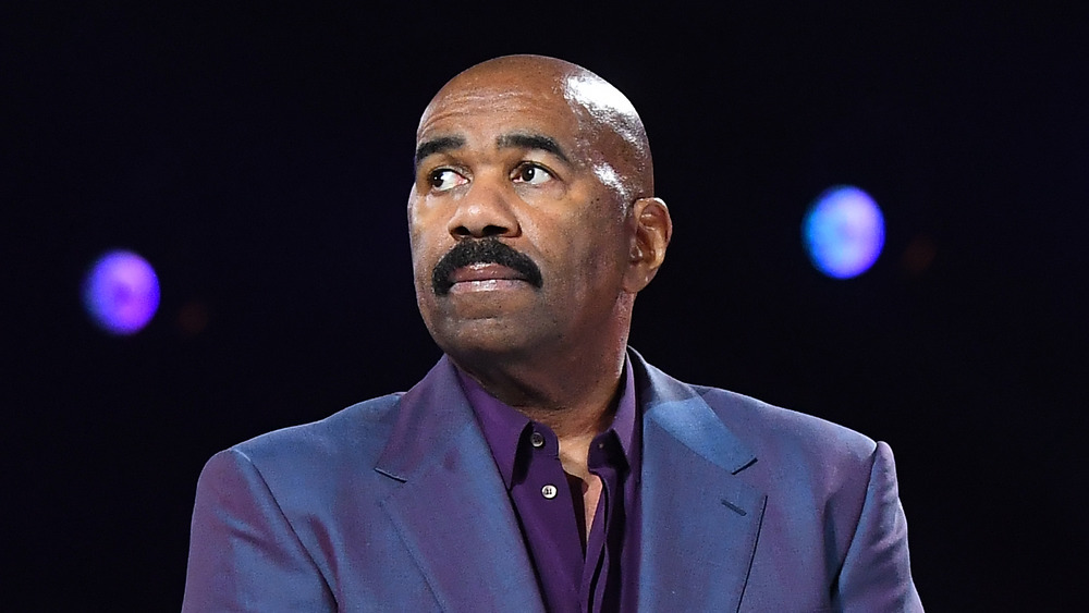 Steve Harvey wearing blue suit