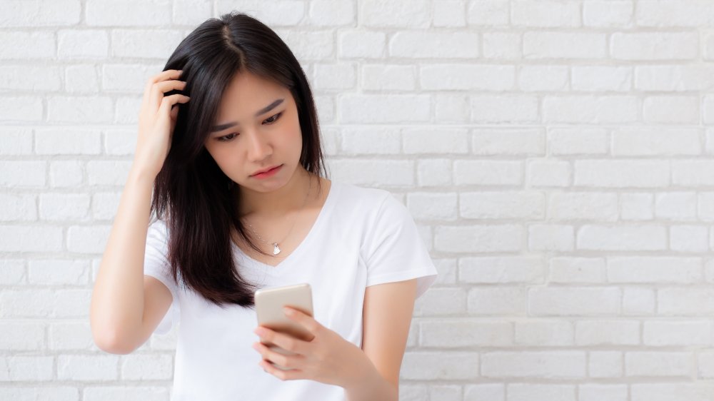 Woman holding phone