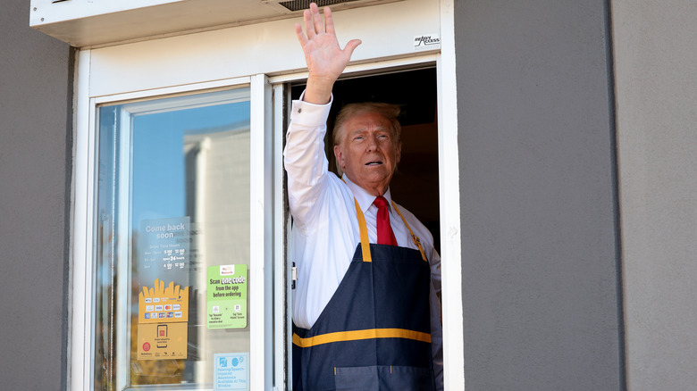 Donald Trump waving from McDonald's