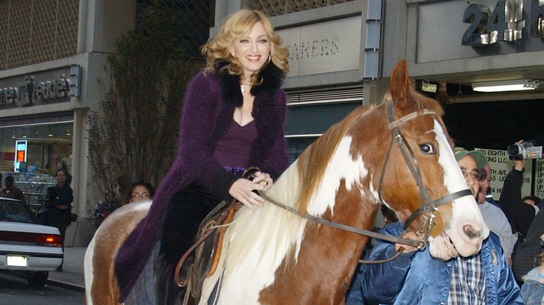 Madonna riding horse 