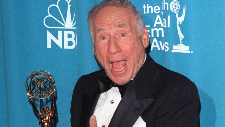 Mel Brooks holding an award