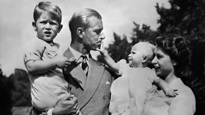 Queen Elizabeth and Prince Philip with Charles and Anne