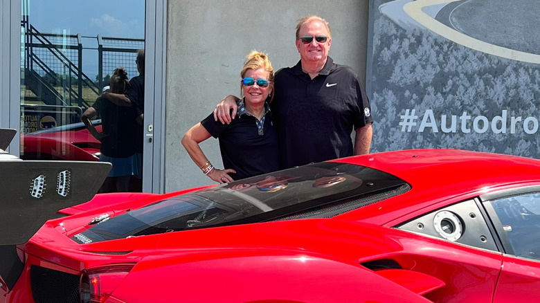 Leigh Anne and Sean Tuohy at racetrack 