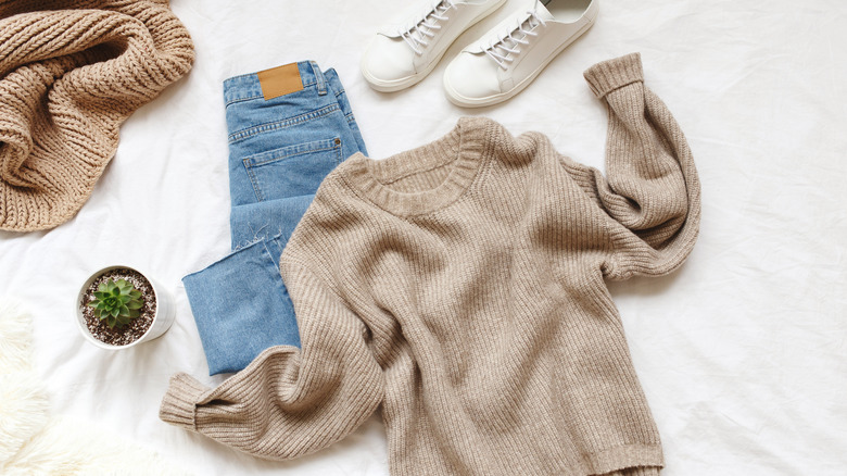 Sweater, sneakers, and jeans