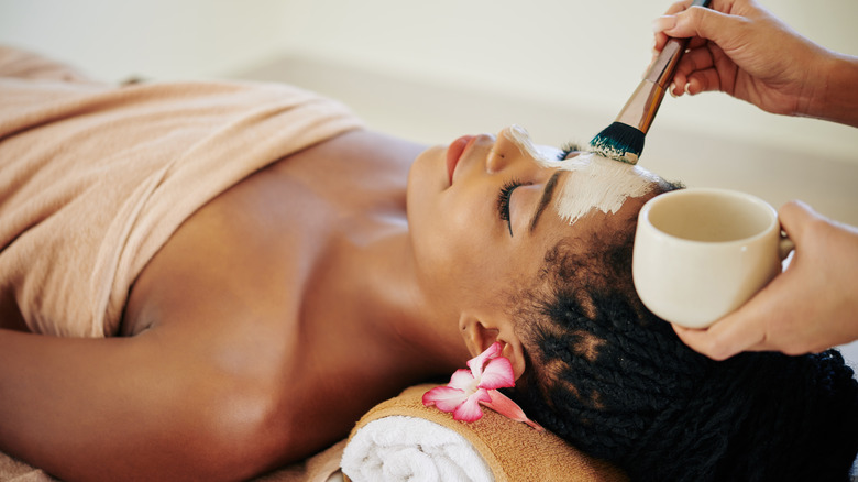 Woman getting a facial treatment