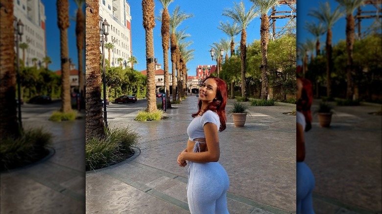 Rae Williams standing and smiling in Las Vegas