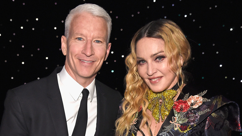 Anderson Cooper and Madonna smiling