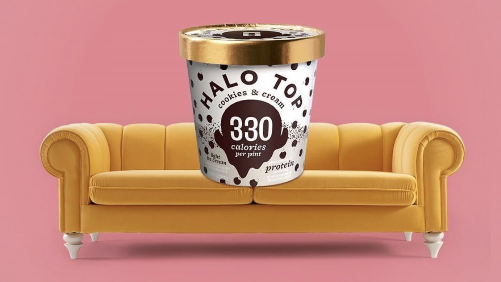 Halo Top pint on a couch