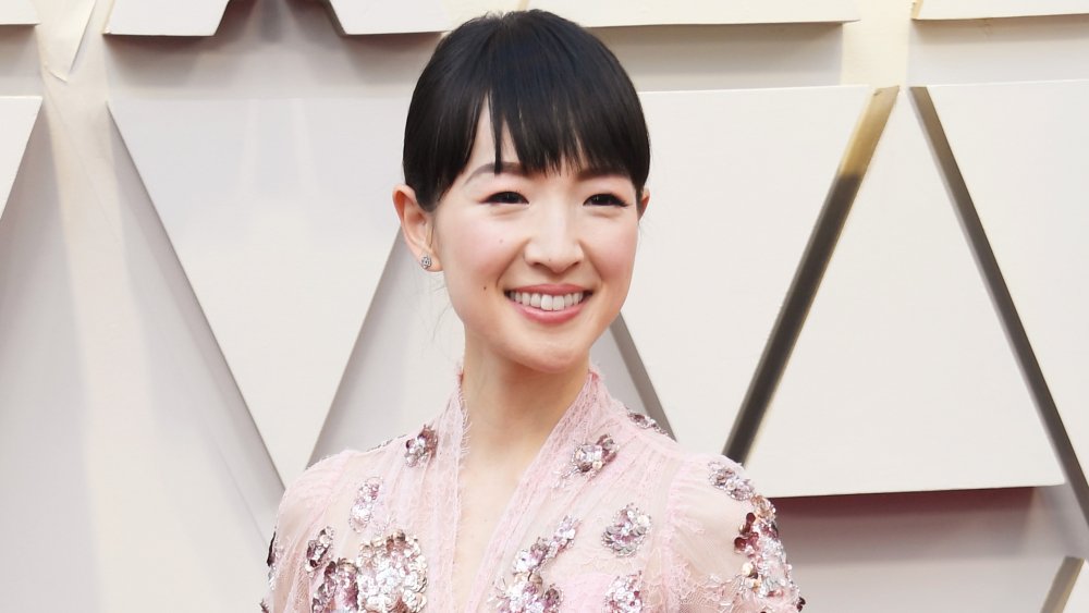 Marie Kondo smiling at a red carpet event