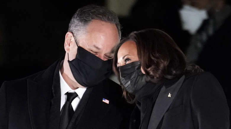 Douglas Emhoff and Kamala Harris snuggle up watching fireworks