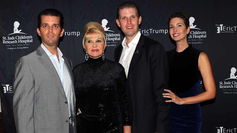 Ivana Trump posing on the red carpet with her children Donald Trump Jr., Eric Trump, and Ivanka Trump