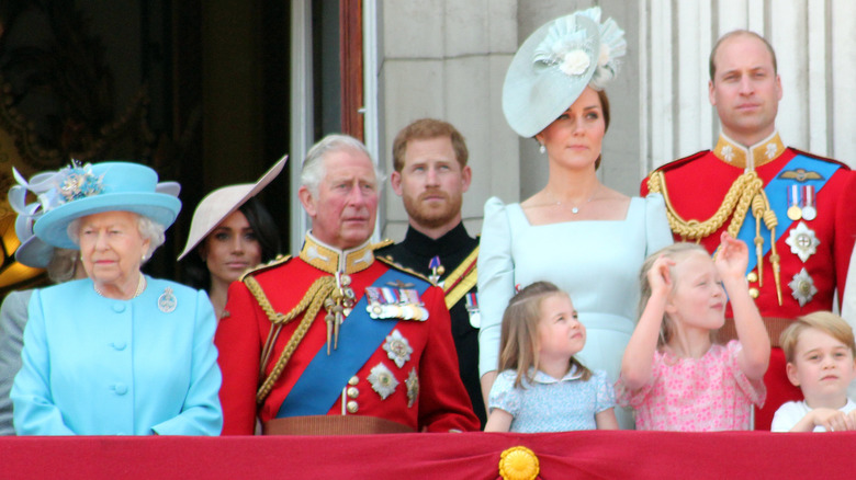 Queen Elizabeth, Prince Philip, Kate Middleton and Prince William, and their two kids at the time all at an event
