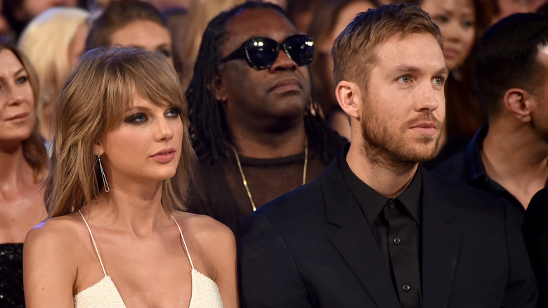 Taylor Swift seated with Calvin Harris at the 2015 Billboard Music Awards