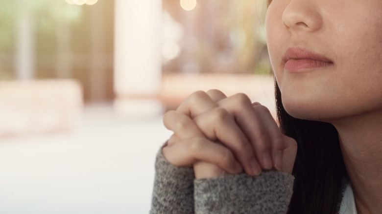 young woman praying