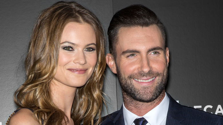 Model Behati Prinsloo and musician Adam Levine attend the closing night gala premiere of 'Begin Again' during the 2014 Tribeca Film Festival at BMCC Tribeca PAC