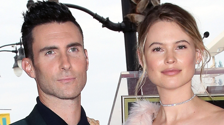 Recording artist Adam Levine (L) and wife model Behati Prinsloo attend his being honored with a Star on the Hollywood Walk of Fame on February 10, 2017 in Hollywood, California. 