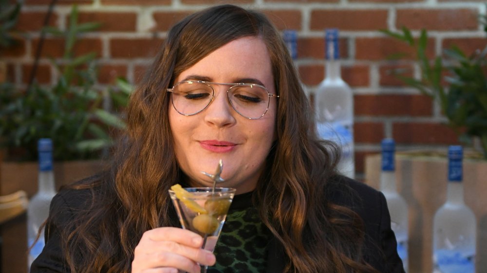 Aidy Bryant drinking a martini at a Gray Goose event in 2019